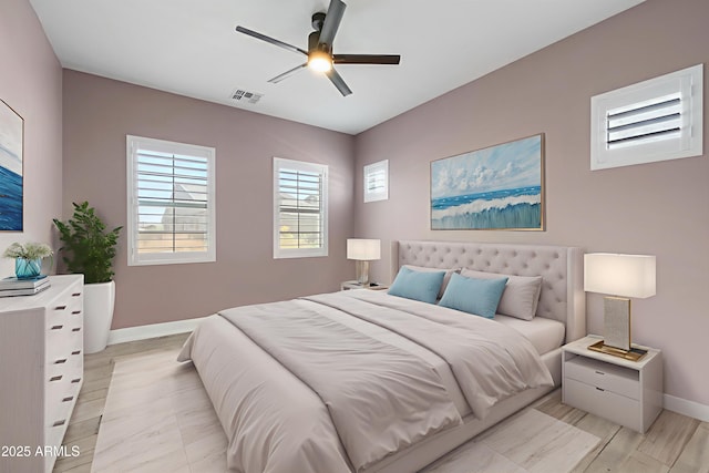 5724 E Scarlet St, Mesa, AZ 85215 - bedroom featuring baseboards and ceiling fan