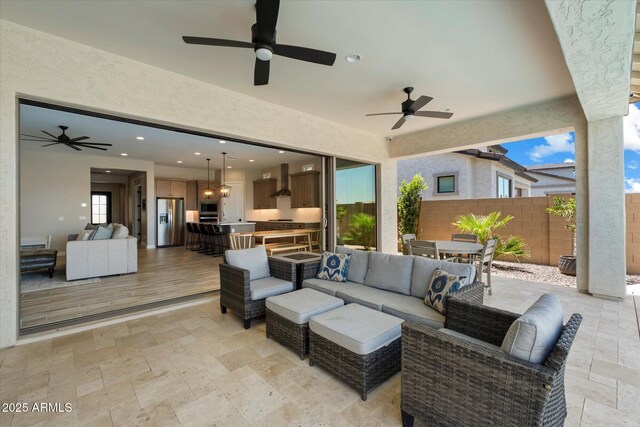 5724 E Scarlet St, Mesa, AZ 85215 - view of patio / terrace with ceiling fan, outdoor lounge area, outdoor dining space, and exterior kitchen