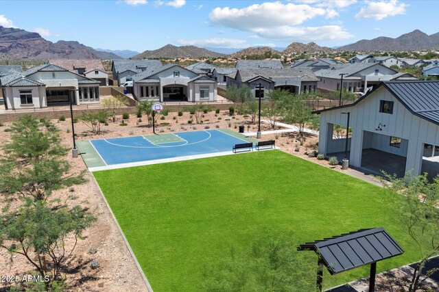 5724 E Scarlet St, Mesa, AZ 85215 - view of basketball court featuring a residential view, community basketball court, a mountain view, and a lawn