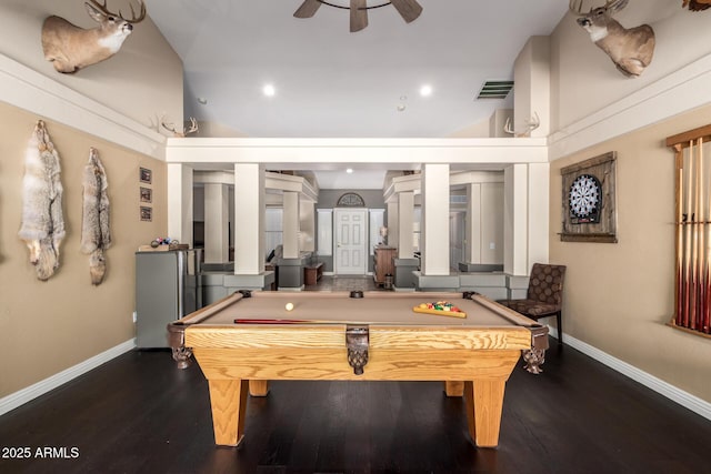 rec room with ceiling fan, lofted ceiling, wood finished floors, visible vents, and baseboards