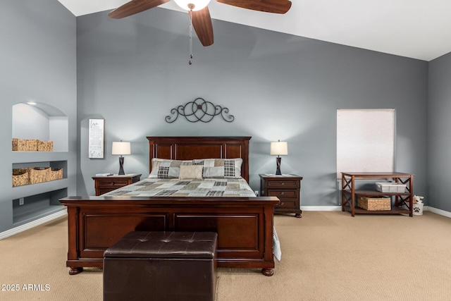 bedroom featuring a ceiling fan, light carpet, and baseboards