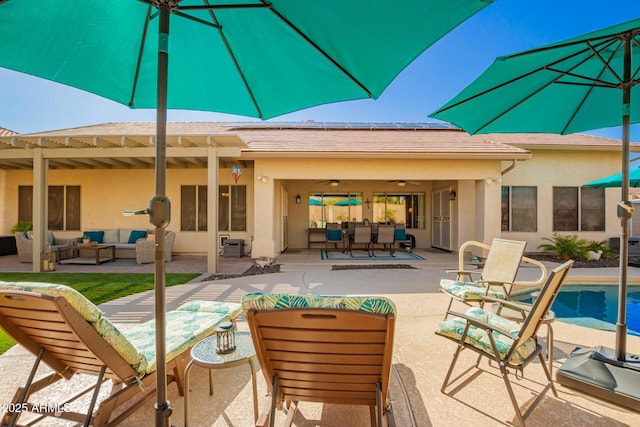 view of patio with outdoor dining space, an outdoor pool, outdoor lounge area, and ceiling fan