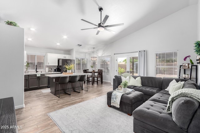 510 S Saddle St, Gilbert, AZ 85233 - living area featuring high vaulted ceiling, a ceiling fan, light wood-style flooring, baseboards, and recessed lighting