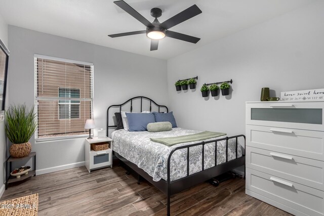 510 S Saddle St, Gilbert, AZ 85233 - bedroom with baseboards, a ceiling fan, and wood finished floors