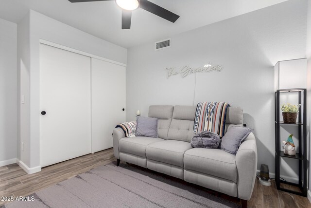 510 S Saddle St, Gilbert, AZ 85233 - living area with baseboards, a ceiling fan, wood finished floors, and visible vents