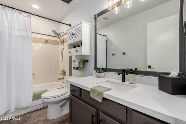 510 S Saddle St, Gilbert, AZ 85233 - bathroom featuring toilet, visible vents, shower / bath combo with shower curtain, wood finished floors, and vanity