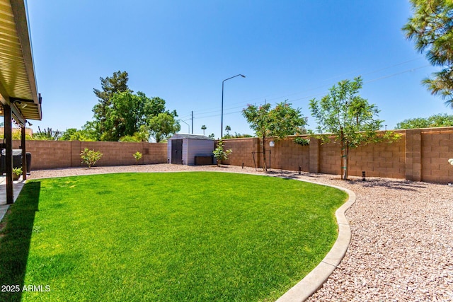 510 S Saddle St, Gilbert, AZ 85233 - view of yard featuring a fenced backyard, an outbuilding, and a shed