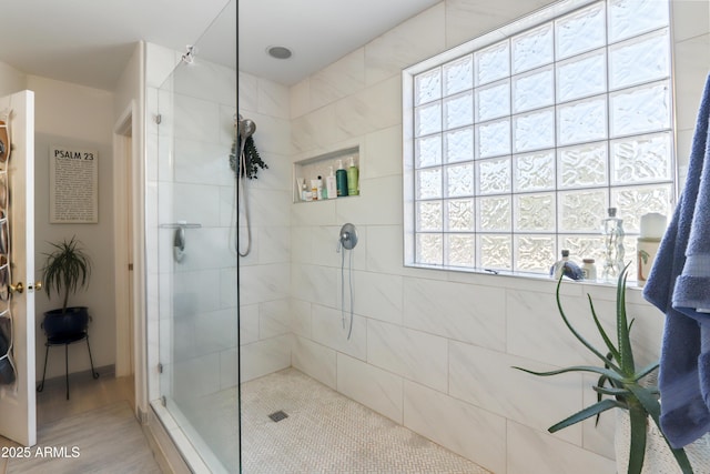 bathroom with a walk in shower