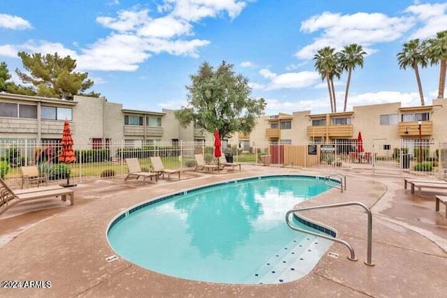 view of pool featuring a patio area