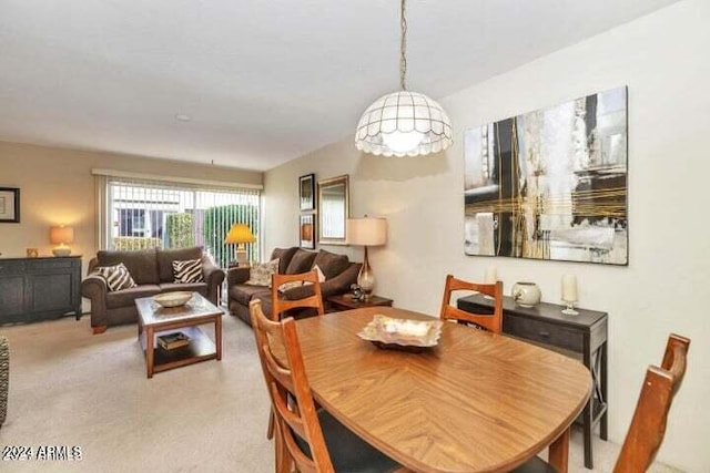 view of carpeted dining room