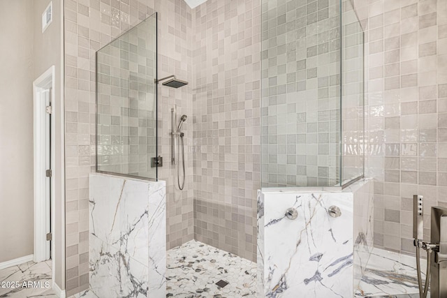 7439 E Beryl Ave, Scottsdale, AZ 85258 - full bath featuring marble look tile flooring and walk in shower