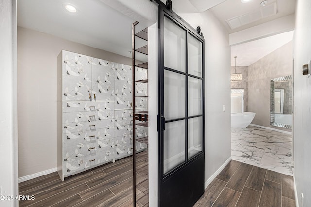 7439 E Beryl Ave, Scottsdale, AZ 85258 - bathroom with wood finished floors, baseboards, recessed lighting, a freestanding tub, and a shower