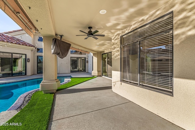 7439 E Beryl Ave, Scottsdale, AZ 85258 - view of patio featuring ceiling fan and an outdoor pool