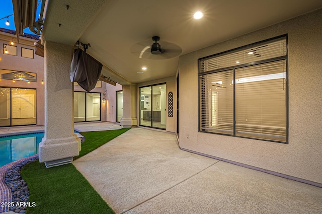 7439 E Beryl Ave, Scottsdale, AZ 85258 - view of patio / terrace with a ceiling fan and an outdoor pool