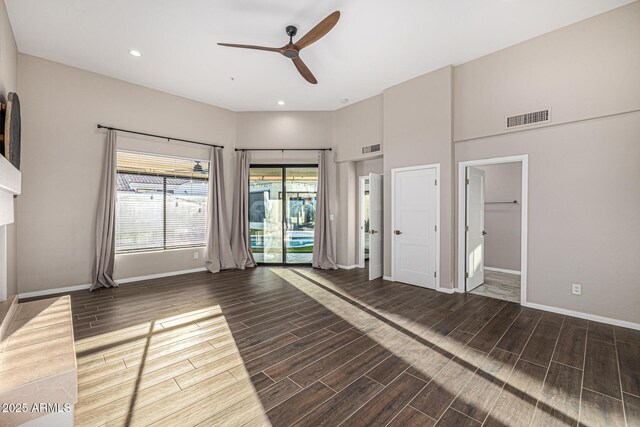 7439 E Beryl Ave, Scottsdale, AZ 85258 - unfurnished bedroom with access to exterior, baseboards, wood finished floors, recessed lighting, and ceiling fan