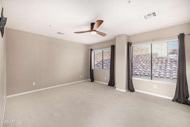 7439 E Beryl Ave, Scottsdale, AZ 85258 - unfurnished room with ceiling fan, light colored carpet, and baseboards