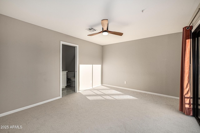 7439 E Beryl Ave, Scottsdale, AZ 85258 - unfurnished bedroom featuring carpet floors, baseboards, ensuite bath, and a ceiling fan