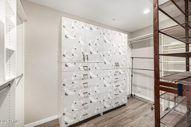 7439 E Beryl Ave, Scottsdale, AZ 85258 - spacious closet featuring wood finished floors