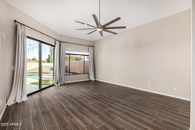 7439 E Beryl Ave, Scottsdale, AZ 85258 - empty room with a ceiling fan, dark wood-style floors, and baseboards