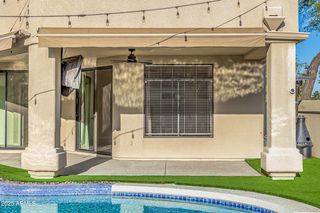 7439 E Beryl Ave, Scottsdale, AZ 85258 - outdoor pool featuring a ceiling fan and a patio