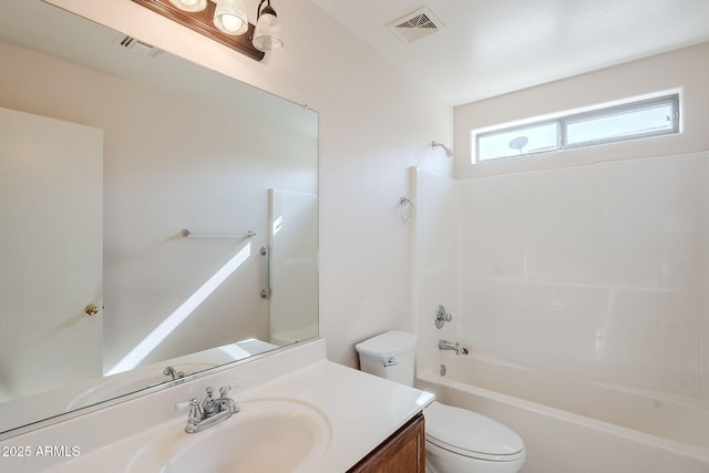 full bathroom with vanity, toilet, and washtub / shower combination