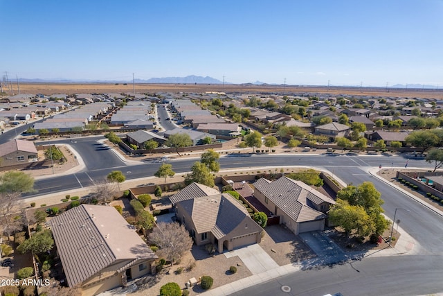 drone / aerial view featuring a mountain view