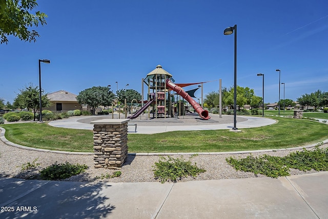 view of play area with a yard