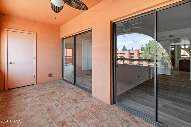 view of patio / terrace featuring ceiling fan