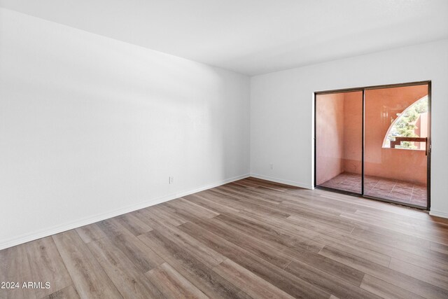 empty room featuring light hardwood / wood-style floors