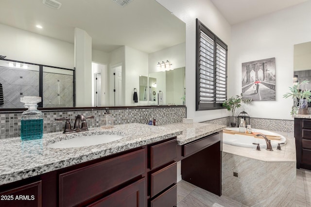 5212 S Seton Ct, Gilbert, AZ 85298 - full bath with a stall shower, a bath, vanity, and decorative backsplash