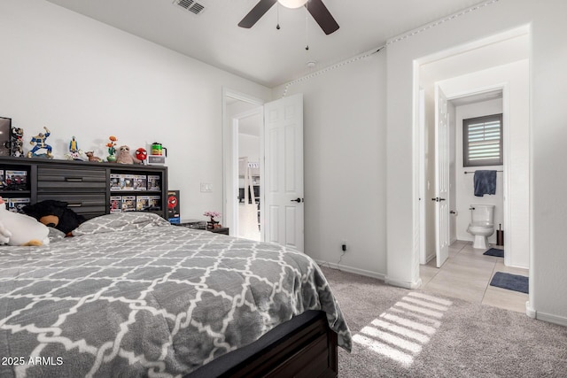 5212 S Seton Ct, Gilbert, AZ 85298 - carpeted bedroom with baseboards, ensuite bath, and ceiling fan