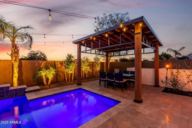 5212 S Seton Ct, Gilbert, AZ 85298 - pool at dusk with a patio area and a fenced backyard