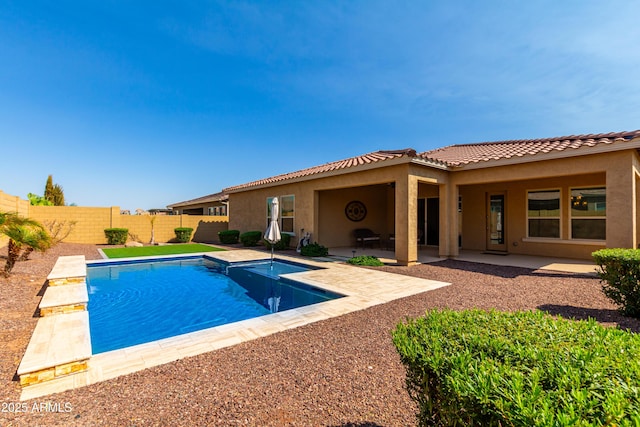 view of swimming pool with a patio area, a fenced backyard, and a fenced in pool