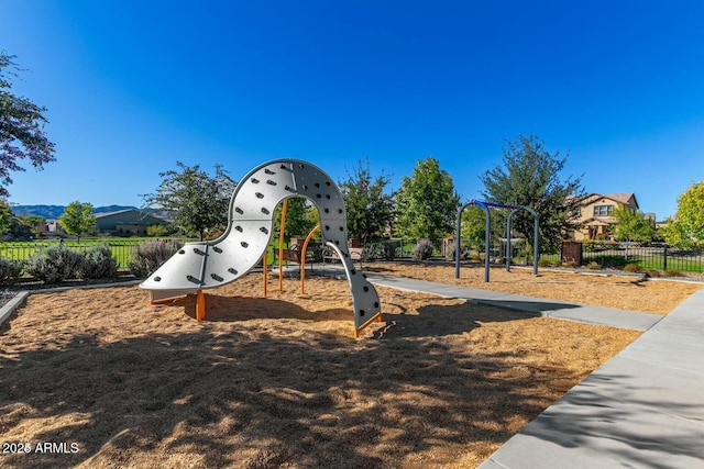 community jungle gym with fence