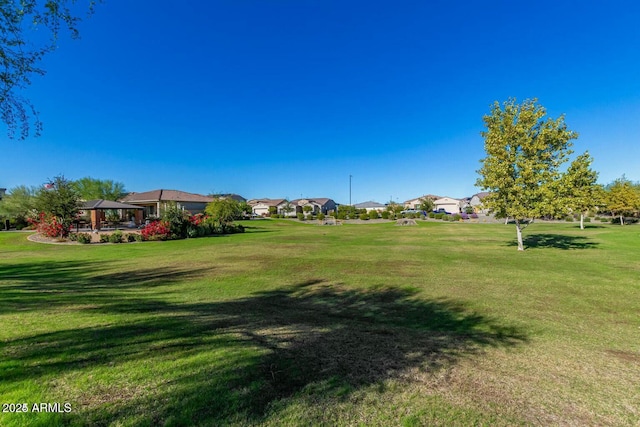 view of yard with a gazebo and a residential view