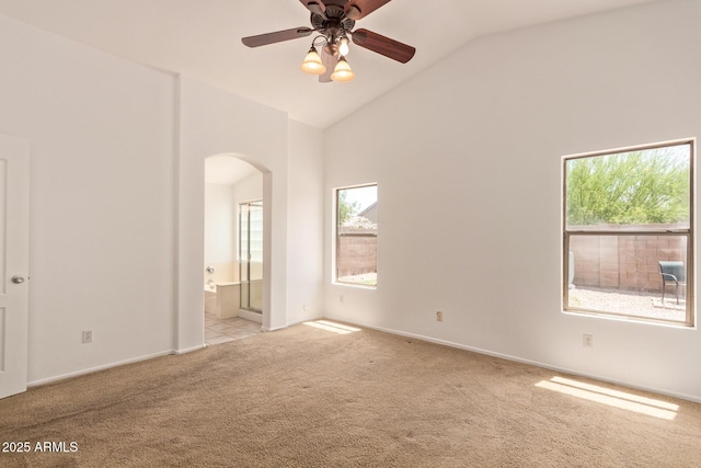4143 E Sundance Ave, Gilbert, AZ 85297 - unfurnished bedroom with arched walkways, carpet, high vaulted ceiling, ensuite bath, and baseboards