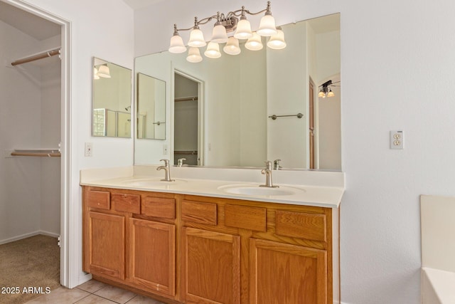 4143 E Sundance Ave, Gilbert, AZ 85297 - full bathroom featuring double vanity, a spacious closet, and tile patterned floors
