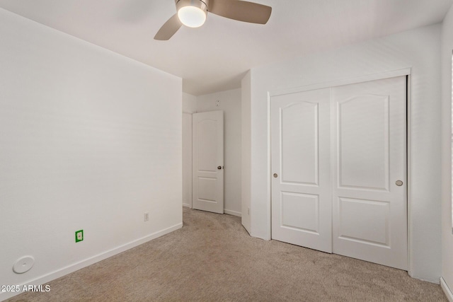 4143 E Sundance Ave, Gilbert, AZ 85297 - unfurnished bedroom featuring carpet flooring, a closet, baseboards, and a ceiling fan