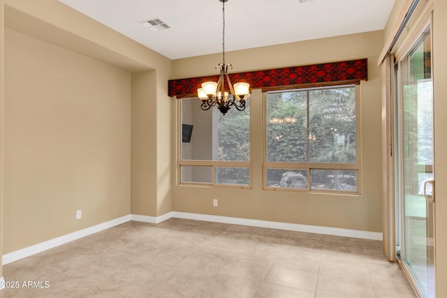 1620 E Sattoo Way, Queen Creek, AZ 85140 - unfurnished dining area featuring a chandelier and baseboards