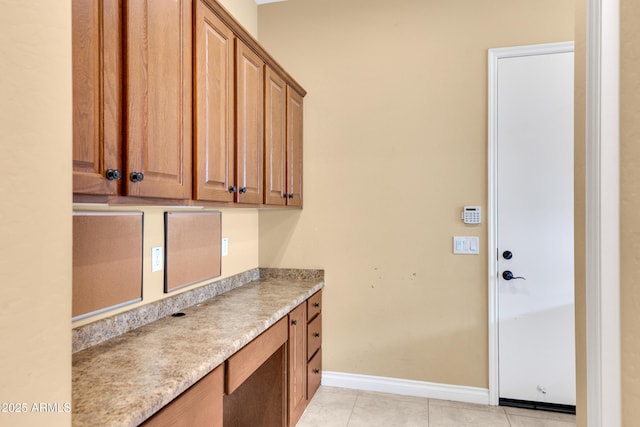 1620 E Sattoo Way, Queen Creek, AZ 85140 - laundry area with baseboards and light tile patterned floors