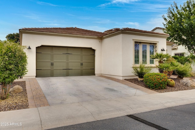 1620 E Sattoo Way, Queen Creek, AZ 85140 - view of front facade with concrete driveway, a garage, stucco siding, and a tile roof