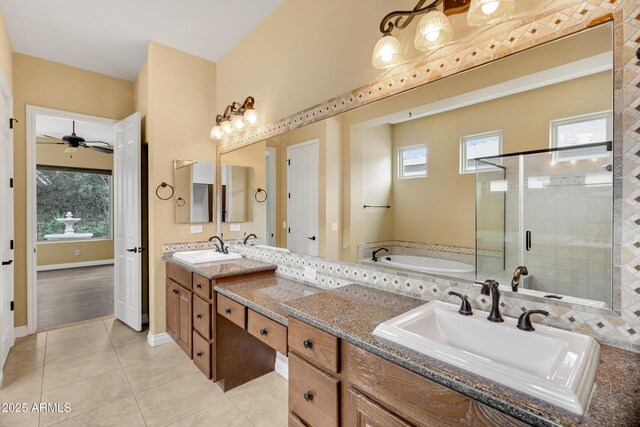 1620 E Sattoo Way, Queen Creek, AZ 85140 - full bath with plenty of natural light, a stall shower, a bath, and tile patterned floors