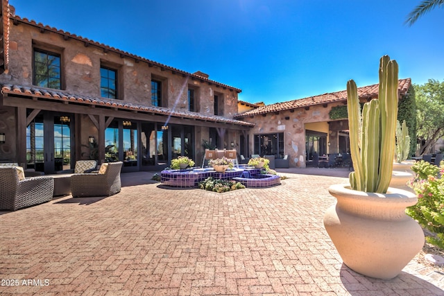 1620 E Sattoo Way, Queen Creek, AZ 85140 - back of house with stucco siding, a patio area, and french doors