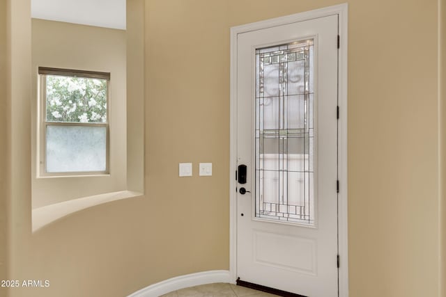 1620 E Sattoo Way, Queen Creek, AZ 85140 - doorway to outside featuring baseboards and light tile patterned flooring