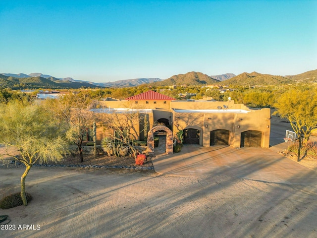 view of front facade featuring a mountain view