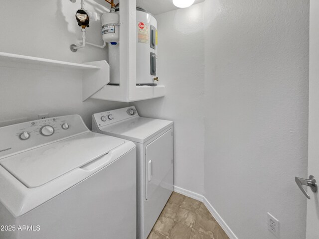 laundry area featuring washer and clothes dryer and water heater