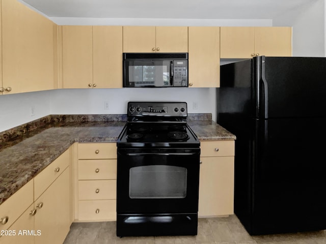 kitchen with light brown cabinets and black appliances