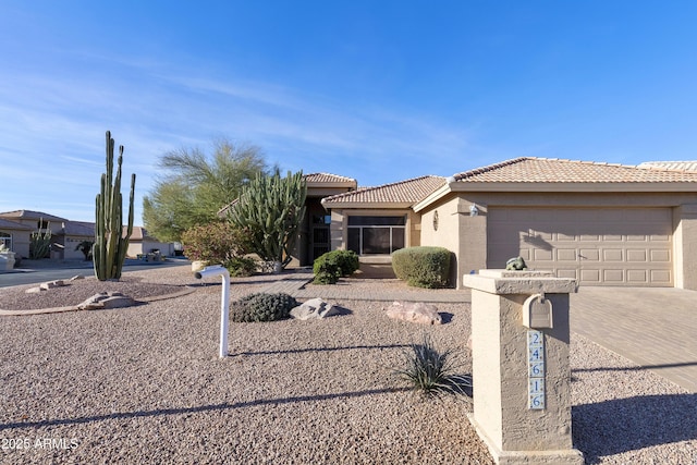 view of front of property with a garage