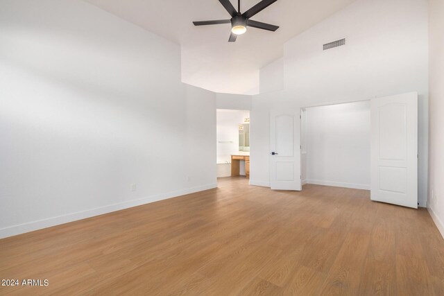 spare room with ceiling fan and dark hardwood / wood-style floors