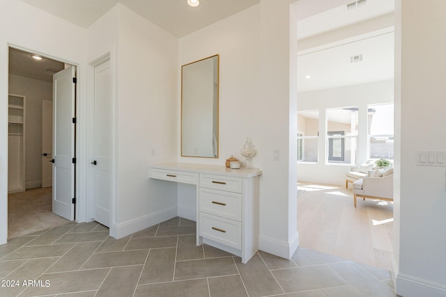 bathroom with tile patterned flooring